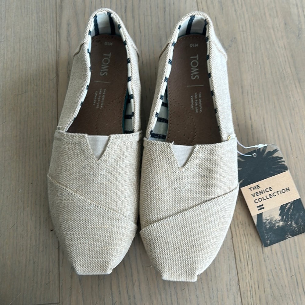 Tom’s Beige men’s slip on beige shoes.